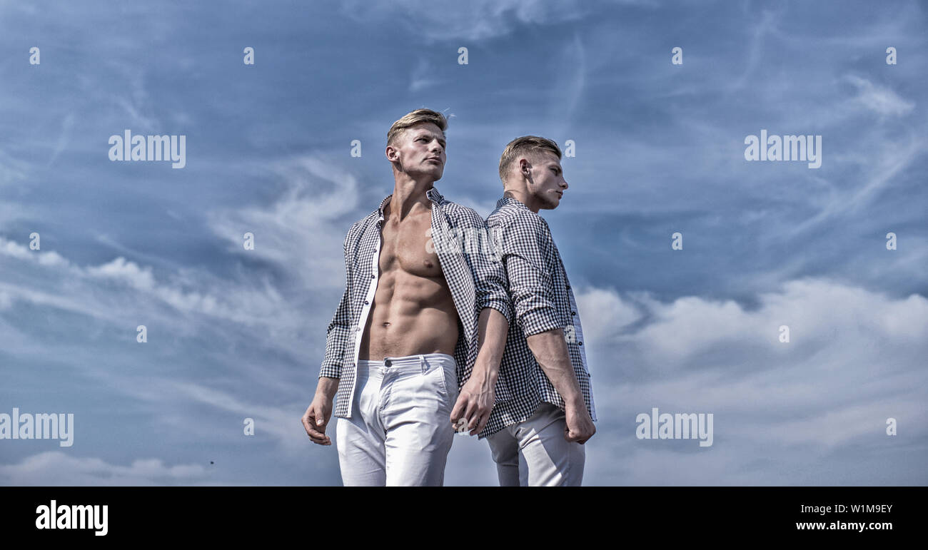 Men strong athlete wear same shirts 