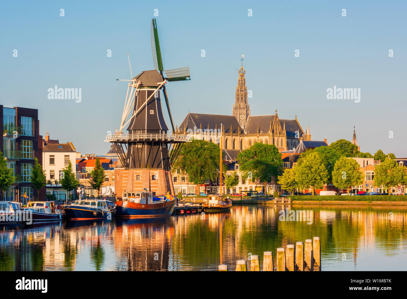 Skyline of Haarlem, North Holland, Netherlands, with Windmill 'De Adriaan' from 1779 and 13th Century Saint Bavo Church Stock Photo