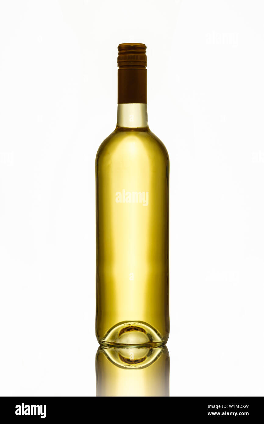 Bottle of white wine in back lit white isolated Stock Photo Alamy
