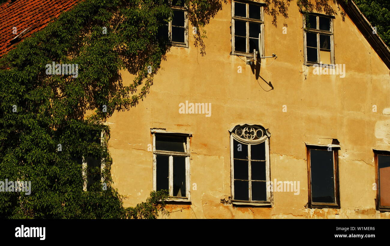 Facade of an old house Stock Photo - Alamy