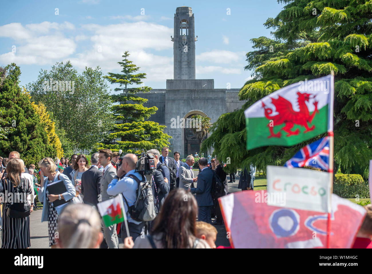 Swansea, Wales, UK. 03rd July, 2019. Prince Charles,  Prince of Wales meets guests during a visit to Victoria Park in Swansea today to help celebrate the 50th anniversary of Swansea achieving City status. The Swansea Guildhall can be seen in the background - on 3rd July 1969, Prince Charles stood on the steps of the Swansea Guildhall to confirm the new city status of Swansea during his Investiture Tour, which was two days after his investiture as Prince of Wales. Credit: Phil Rees/Alamy Live News Stock Photo