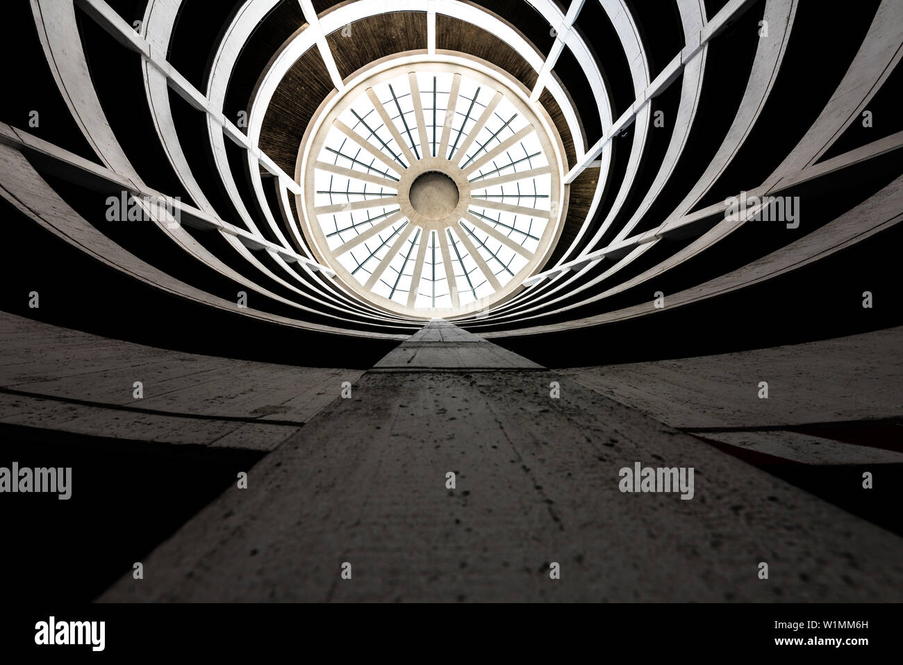 The graphically looking spiral driveway to a multi-storey car park from a low angle view, Hamburg, Germany Stock Photo