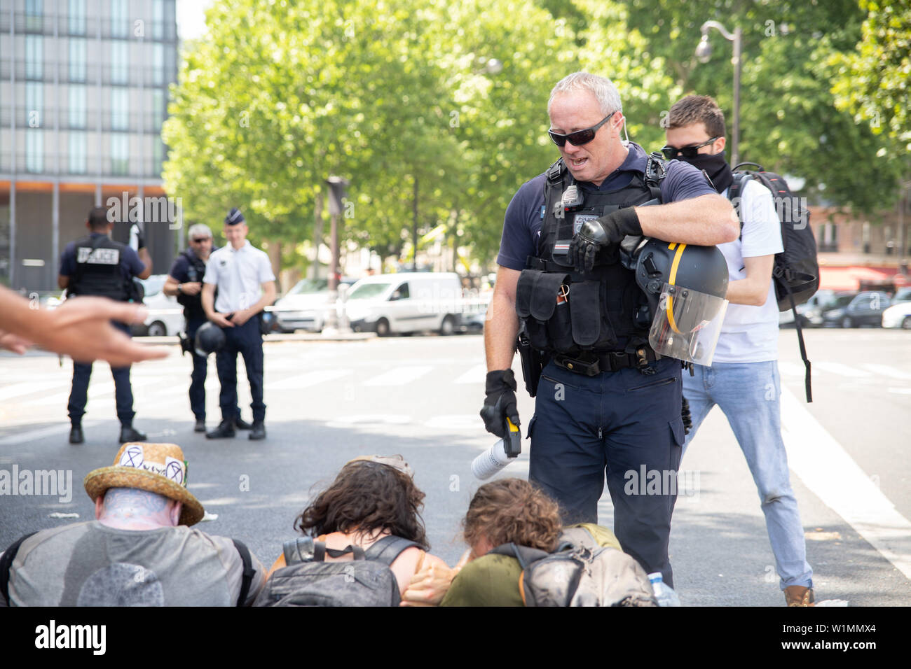 Extinction Rebellion Members evacuated by police officers Stock Photo