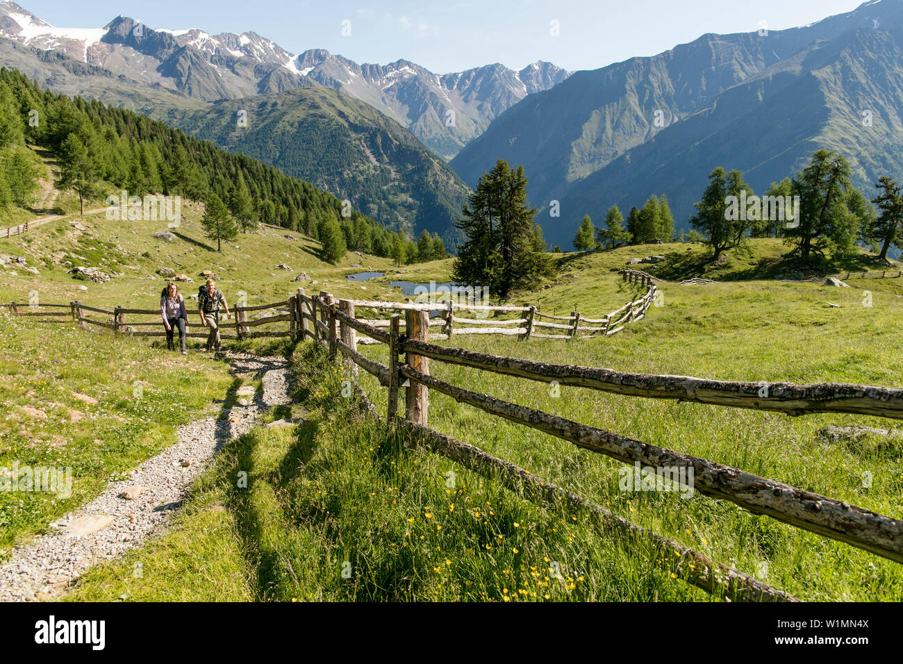 Couple hiking in the mountains Stock Photo