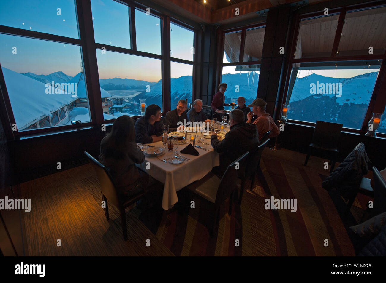 Group of people having dinner in a restaurant, Alyeska Resort, Girdwood, Alaska, USA Stock Photo