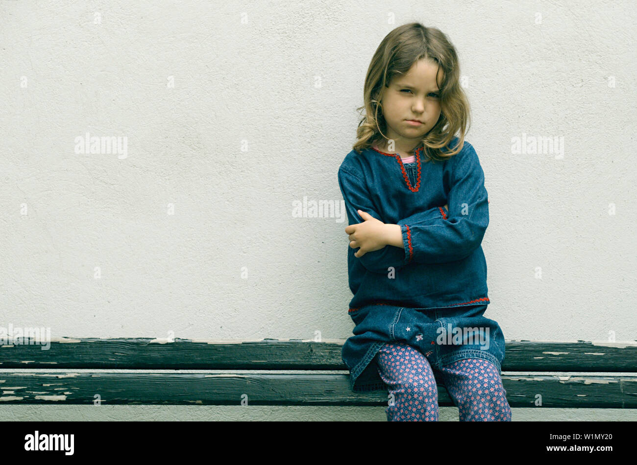 Maedchen auf Bank Stock Photo