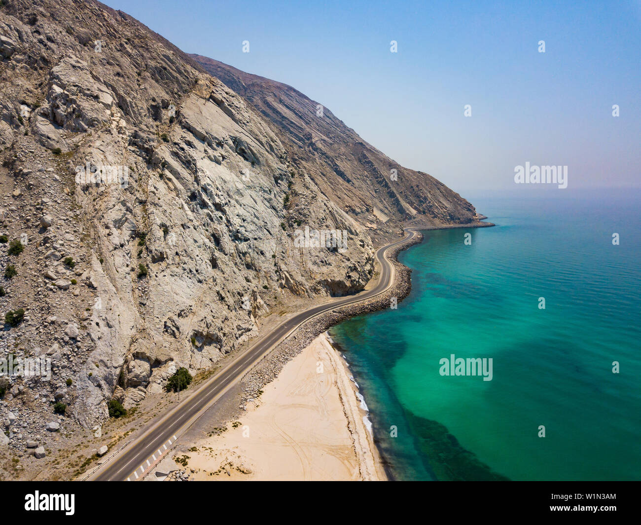 Coastal road and seaside in Musandam Governorate of Oman aerial view Stock Photo