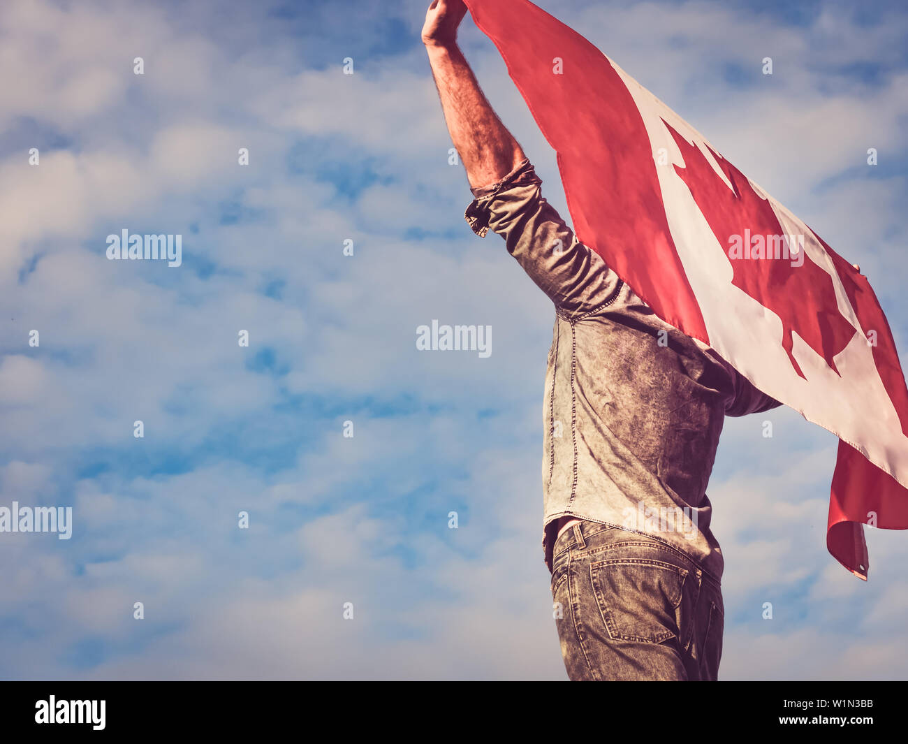 Holding canadian flag close up hi-res stock photography and images - Alamy