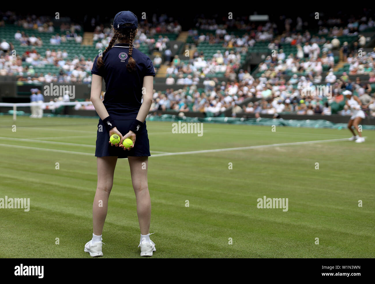 A ball girl during day three of the Wimbledon Championships at the All England Lawn Tennis and