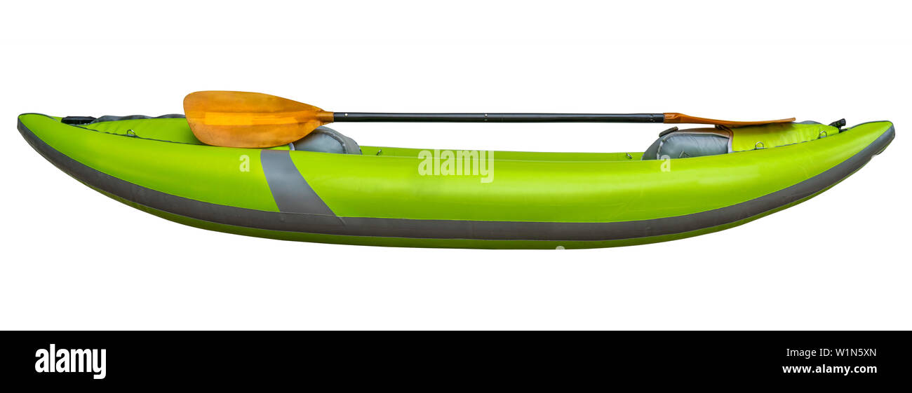 green inflatable whitewater one person kayak with a paddle isolated on white with clipping path, side view Stock Photo