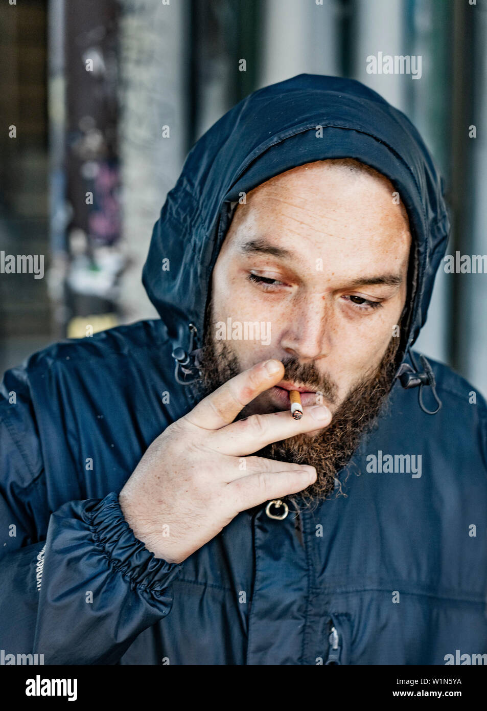 street portrait of a middle aged man in Philadelphia smoking Stock Photo