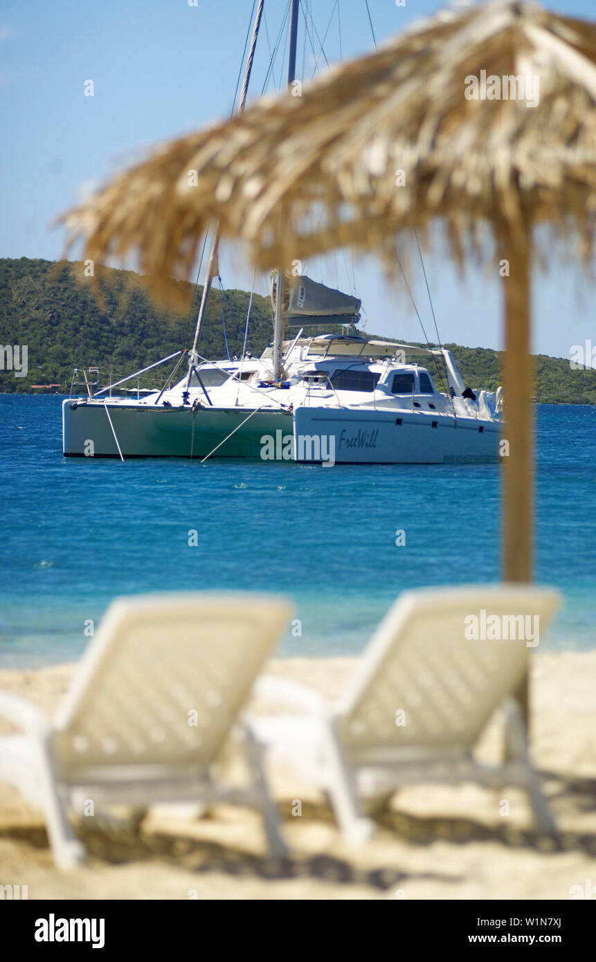 Family seating in the sand hires stock photography and images Alamy