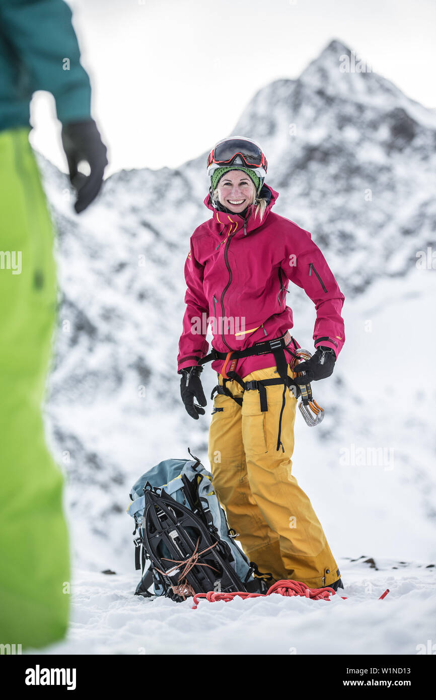 Young female snowboarder in the mountains, Pitztal, Tyrol, Austria Stock Photo