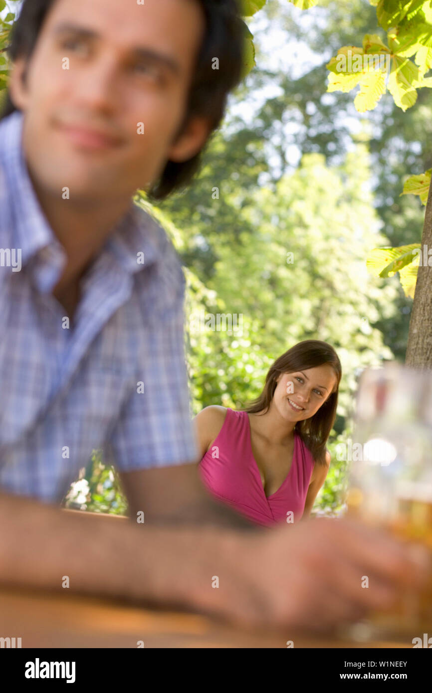 Flirt in beergarden, Starnberger See Bavaria, Germany Stock Photo