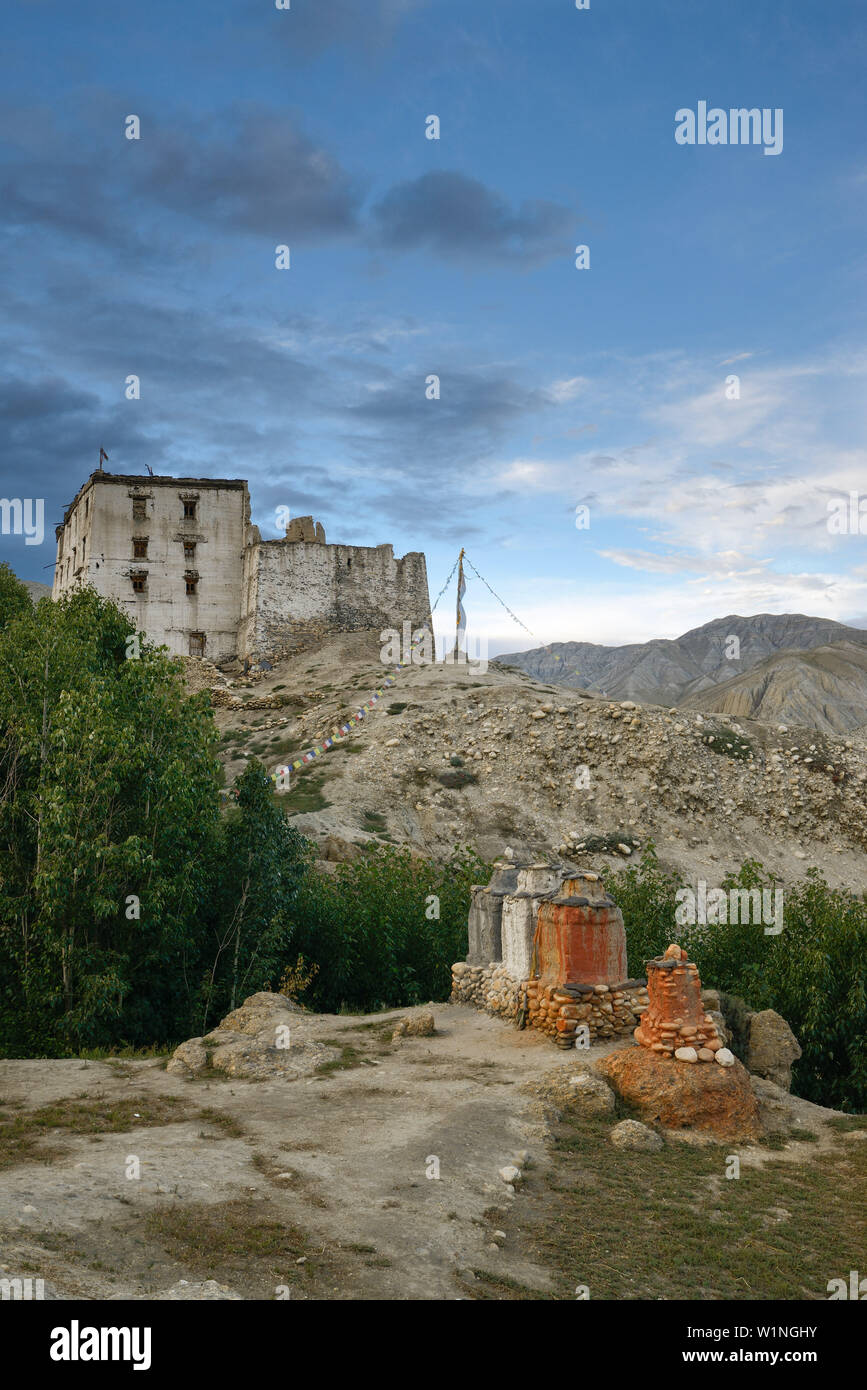 King's palace and chorten in Tsarang, Charang, tibetian village with a