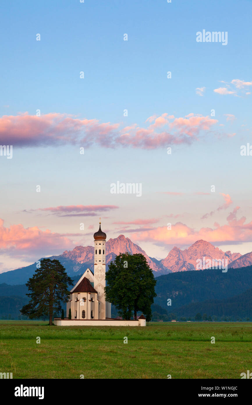 St Coloman pilgrimage church near Schwangau at dawn, view to Tannheimer ...
