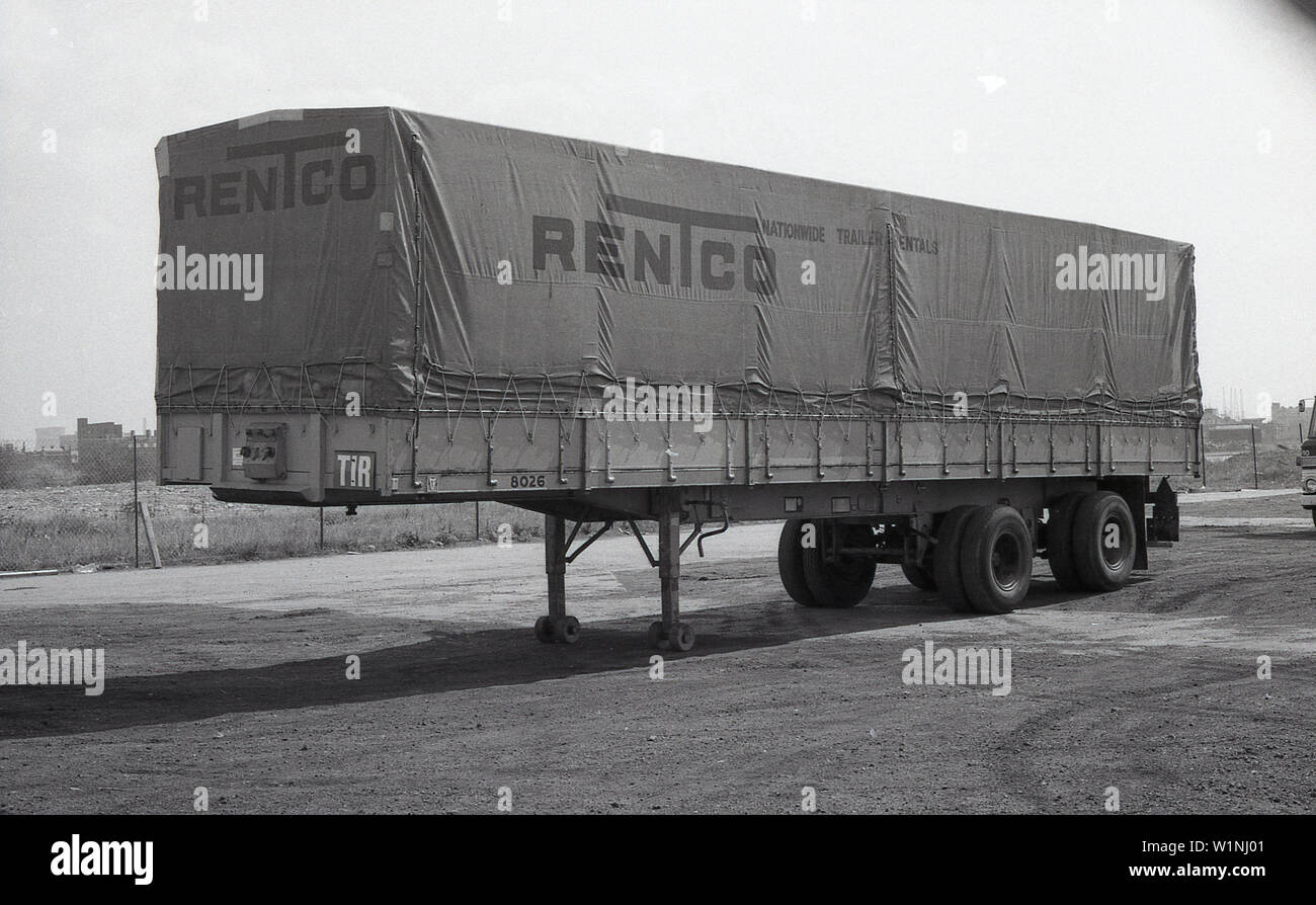 1970s, historical, a trailer of a truck parked in a industrial Stock ...