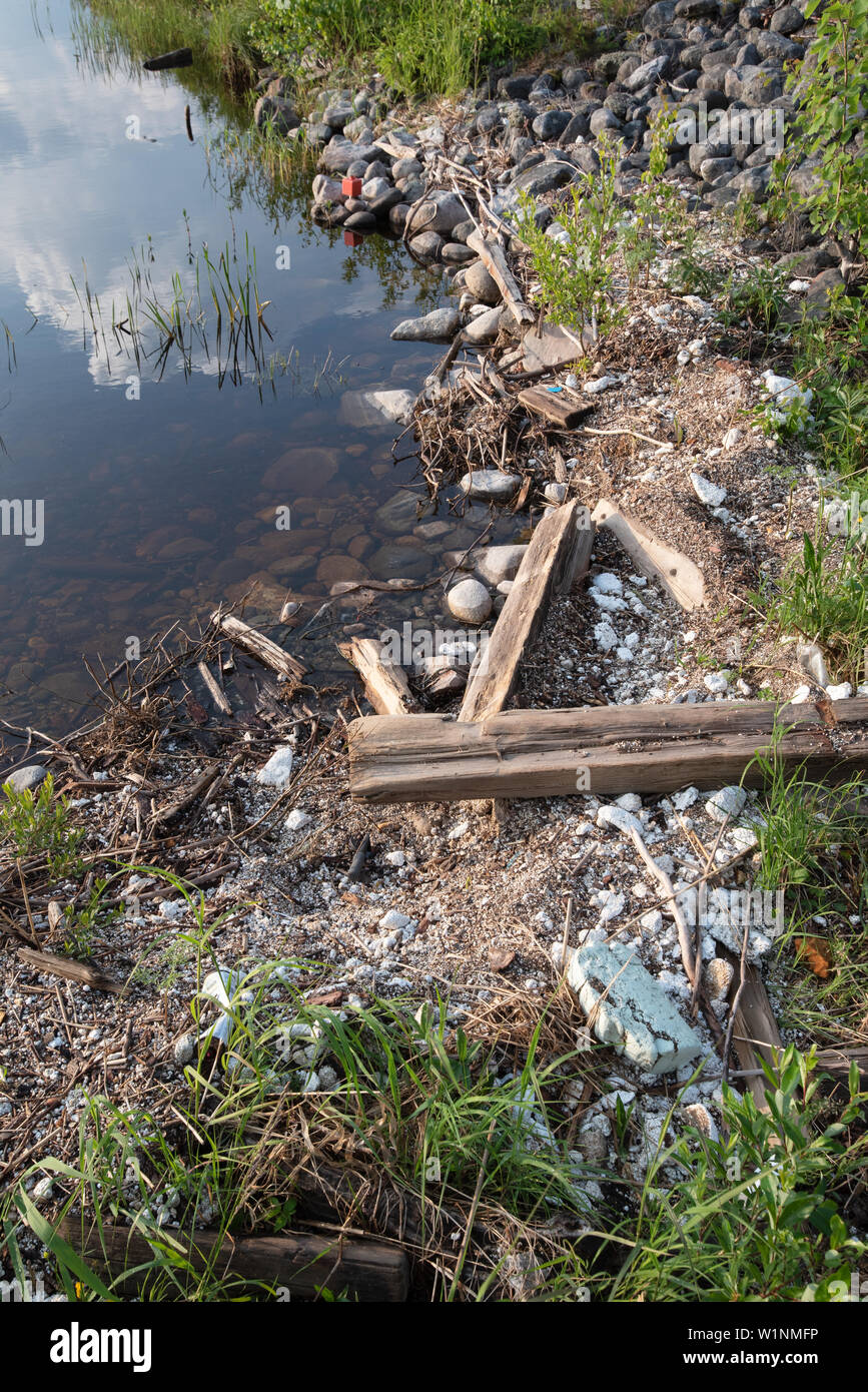 Polystyrene, styrofoam garbage on the shore. Stock Photo