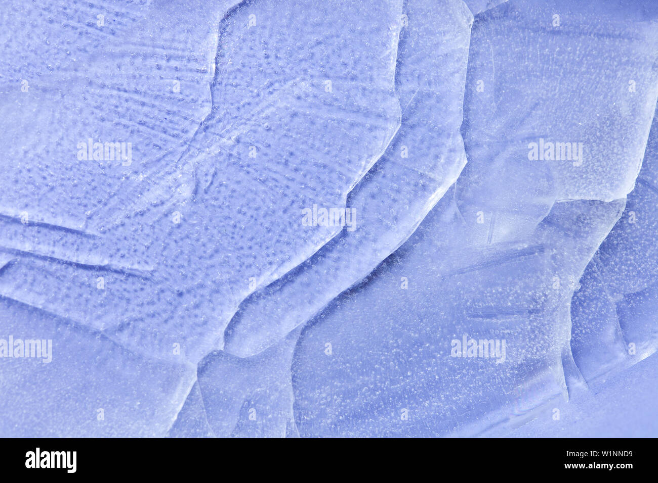 blue cracked ice. texture of frozen water Stock Photo - Alamy