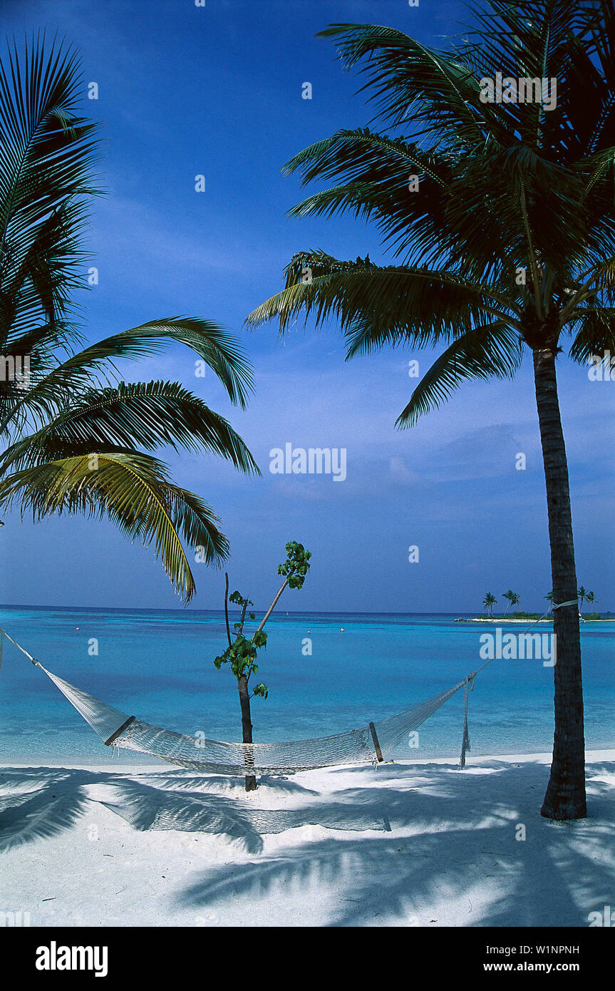 Hammock on the Beach, Four Seasons Resort, Kuda Hurra Maledive Island Stock Photo