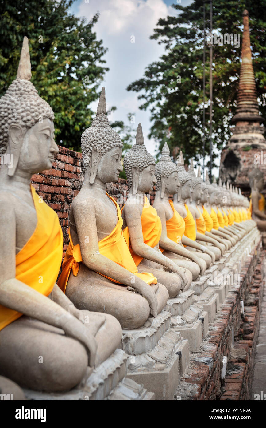 Buddhas wrapped with silk robes at Wat Yai Chai Mongkol, Ayutthaya, Thailand, Southeast Asia, UNESCO World Heritage Stock Photo