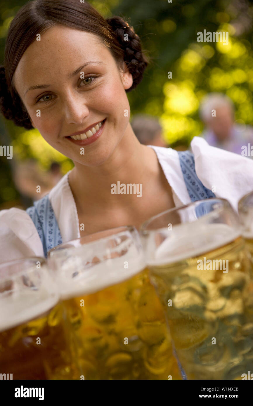 Waitress carrying beer steins hires stock photography and images Alamy