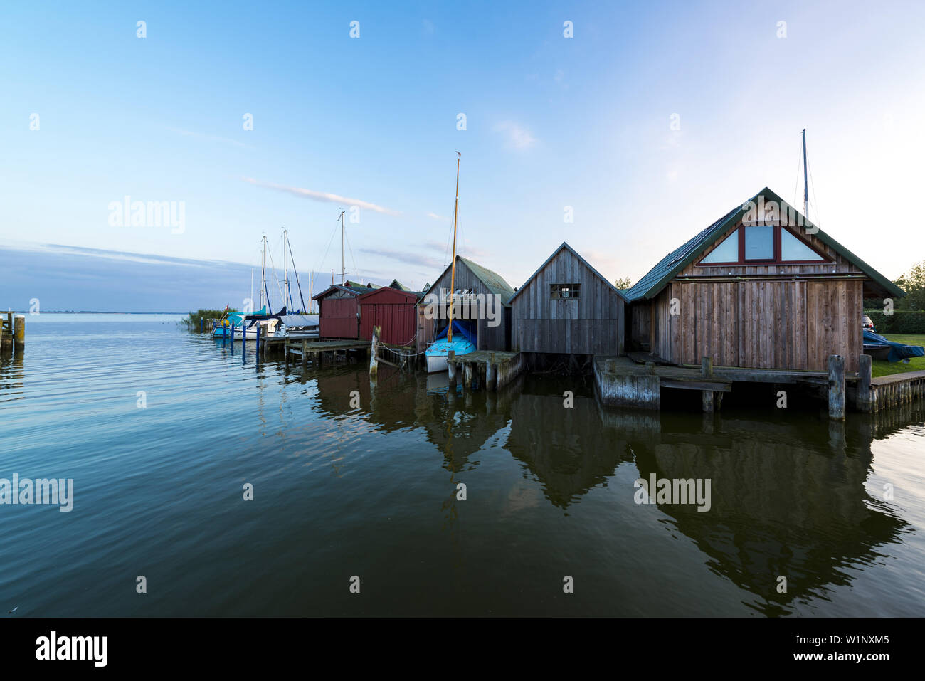 Boathouses in the Evening Mood at the port Althagen in Ahrenshoop by the Bodden at the Darß. Althagen, Ahrenshoop, Darß, Mecklenburg-Vorpommern, Germa Stock Photo