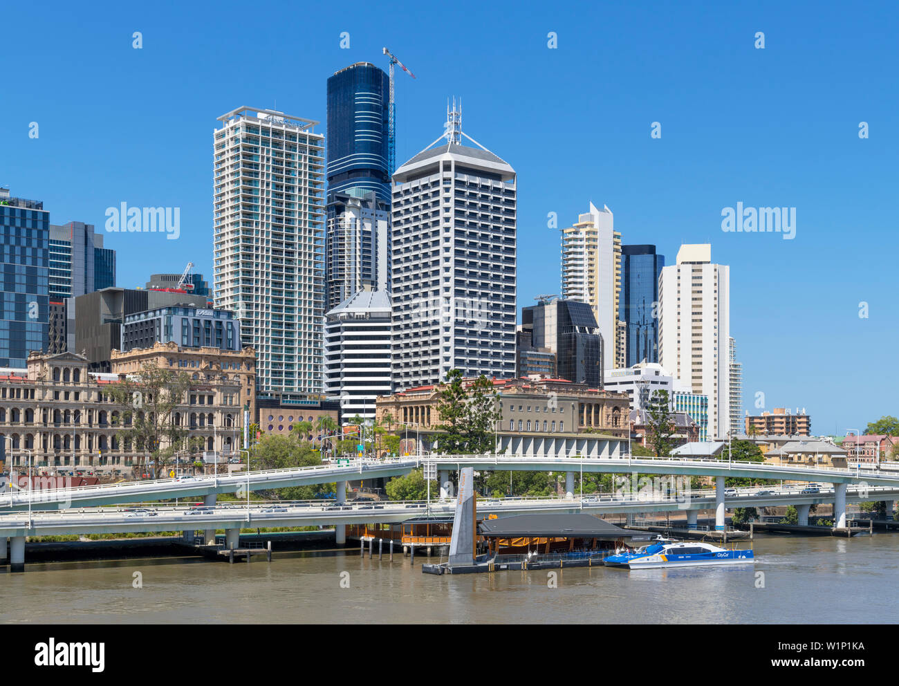 CityCat ferry at North Quay terminal  in front of the Central Business District skyline, Brisbane, Queensland, Australia Stock Photo