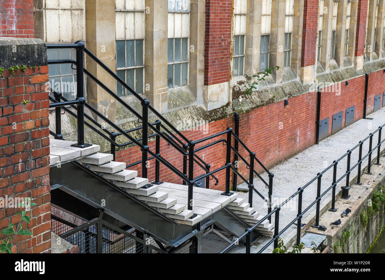 Old Warehouse Building and steps Feeder Canal Bristol West of England Stock Photo