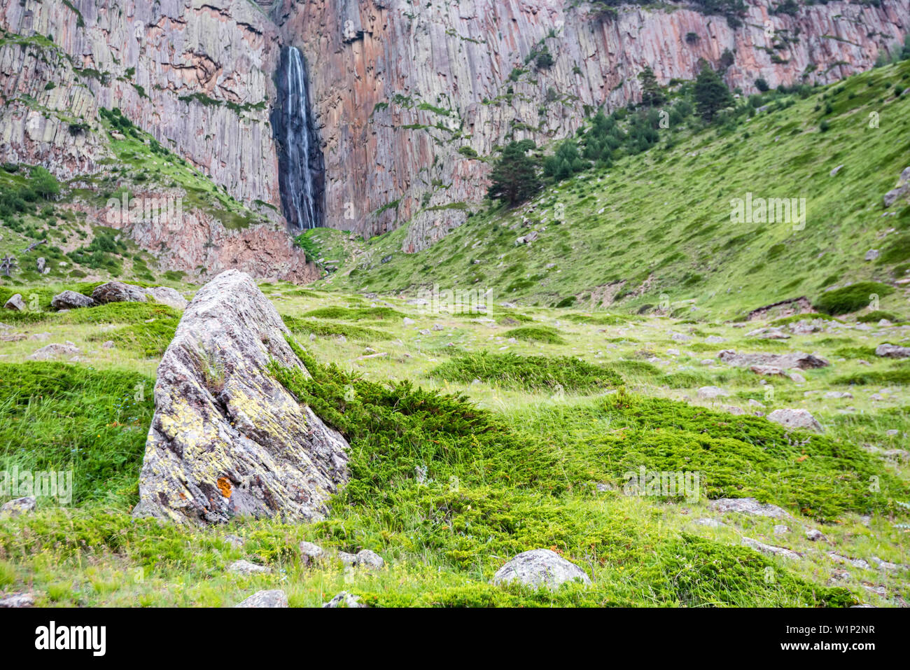 Summer landscape with mountain waterfall between two rocks Stock Photo ...