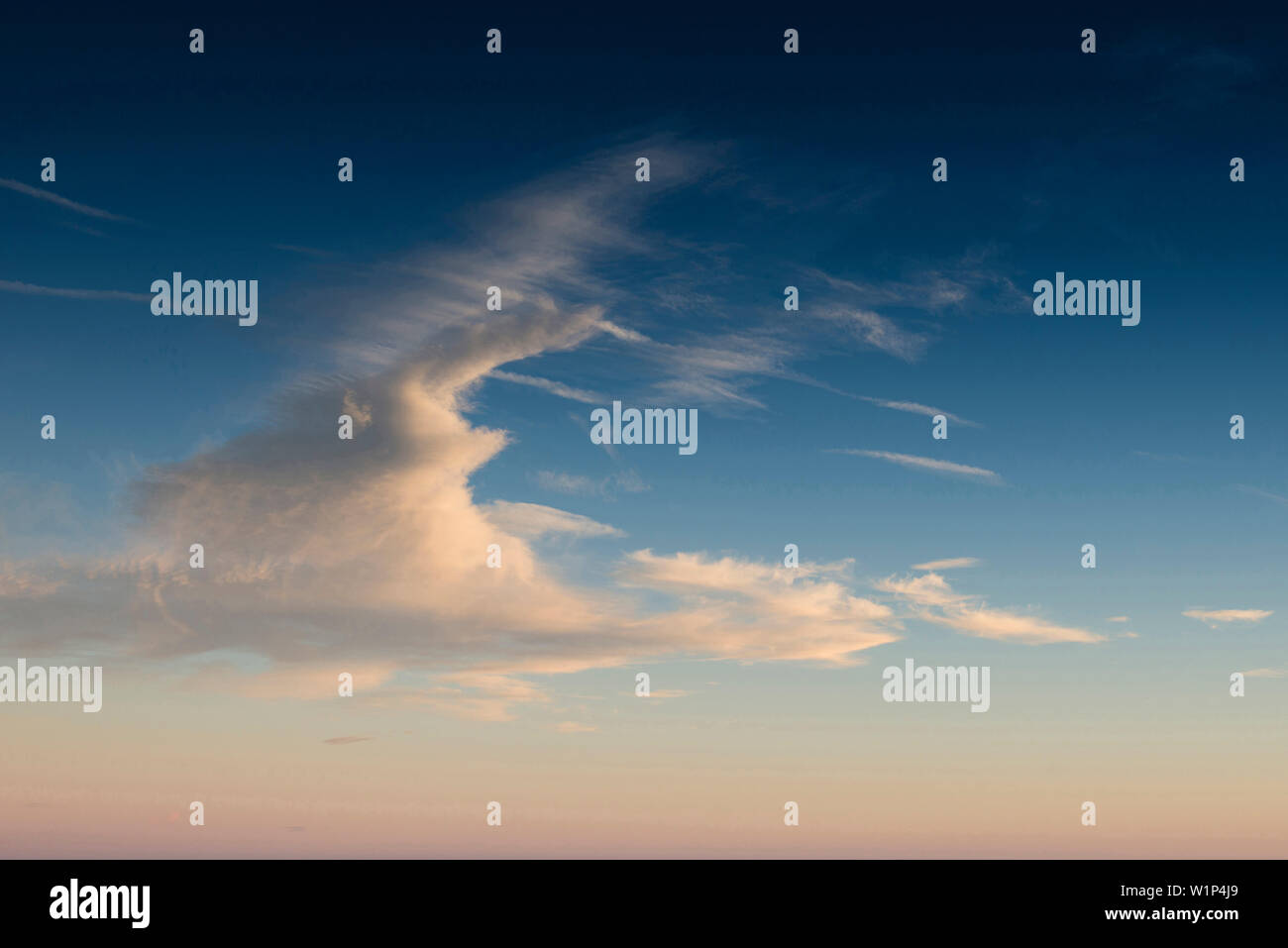 Cirrus clouds and blue sky, sunset Stock Photo