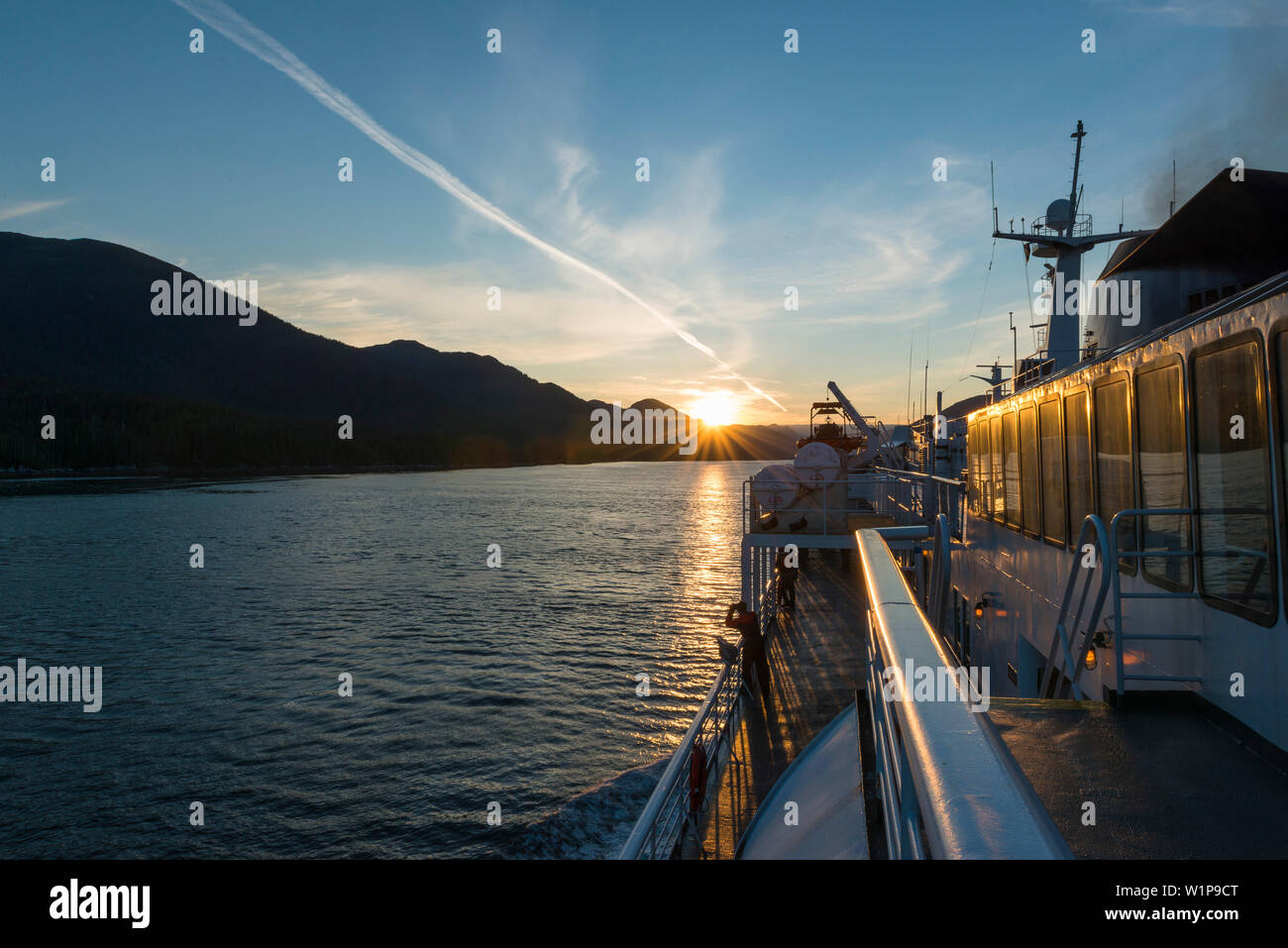 sunset on the deck of the ferry, Inside Passage, Canada Stock Photo