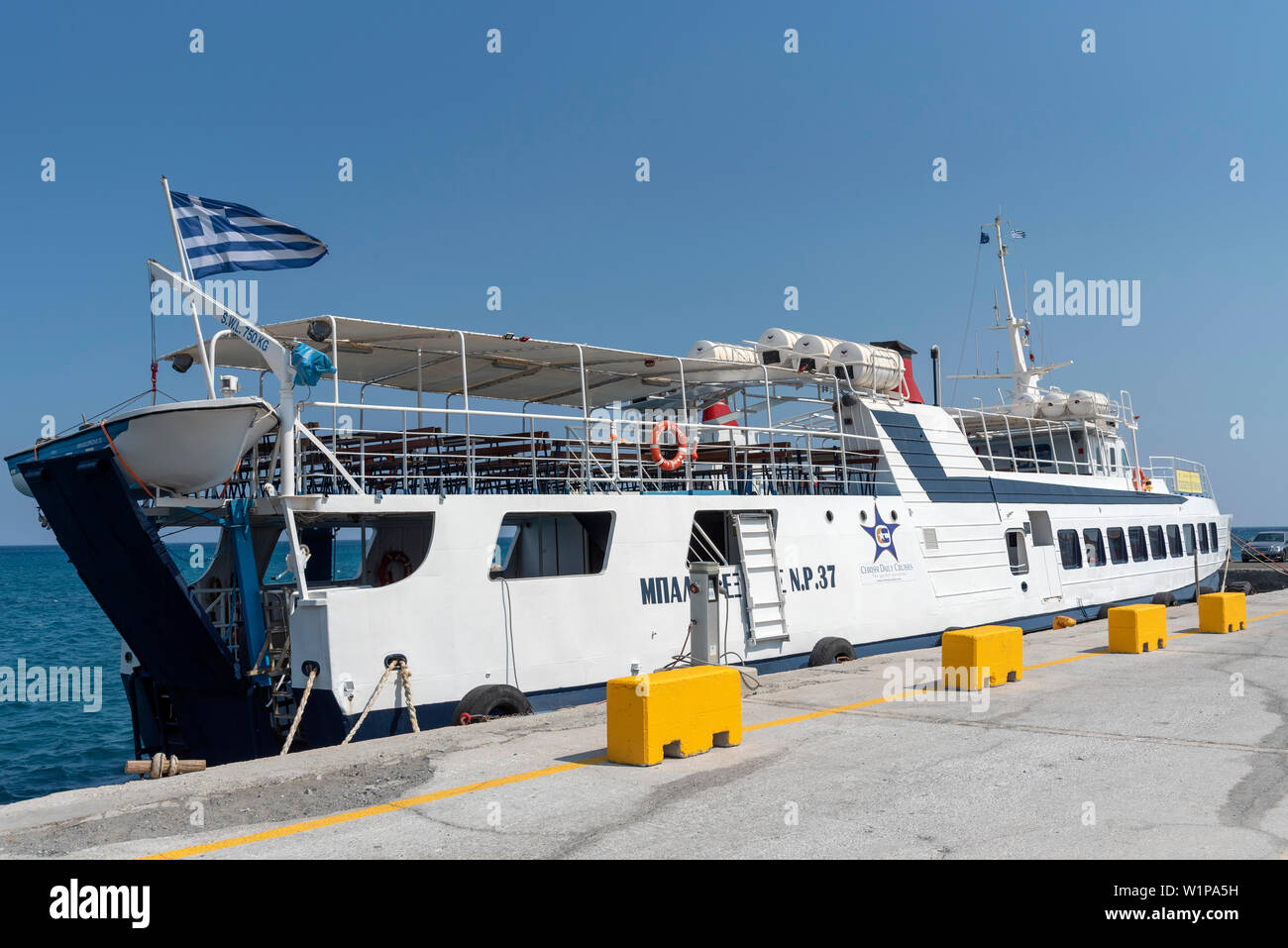 Ierapetra, Crete, Greece. June 2019. A ferry the Balos Express which sails to Chrissi Island berthed in the harbour at Ierapetra Stock Photo