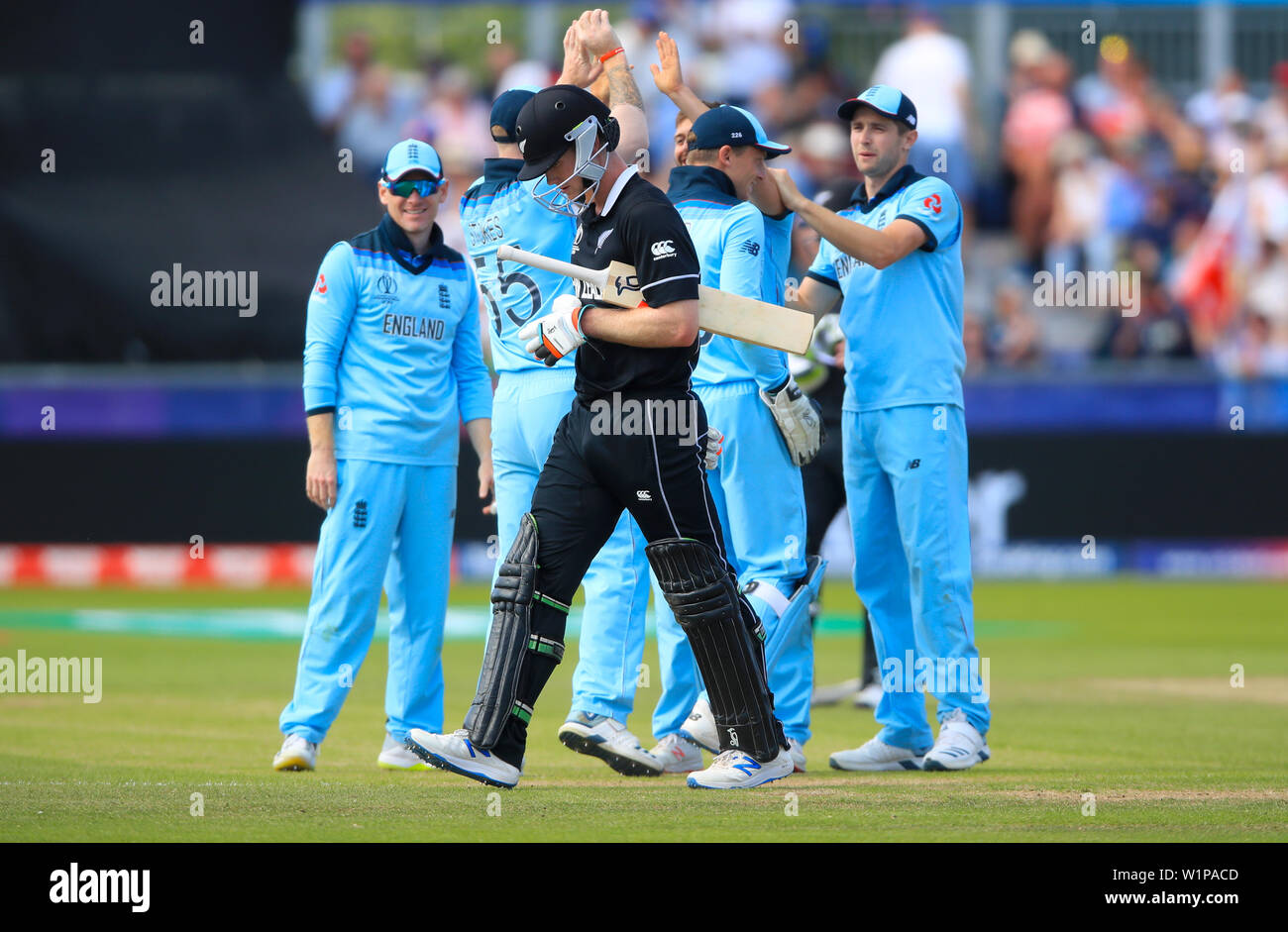 New Zealand's Jimmy Neesham after being bowled out by England's Mark Woods during the ICC cricket World Cup group stage match at Riverside Durham, Chester-le-Street. Stock Photo