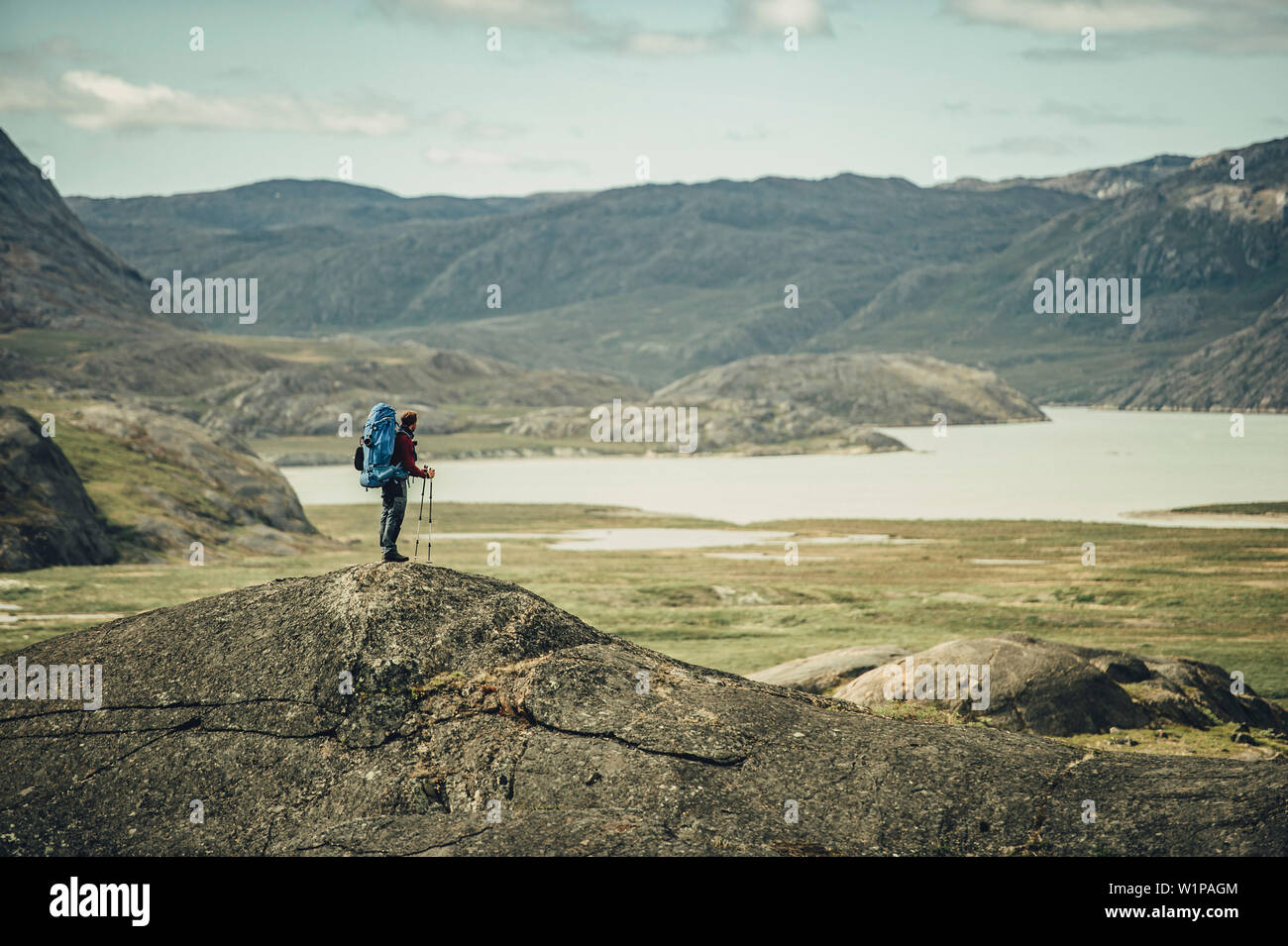 Hiker On A Route Through Greenland Greenland Arctic Stock Photo Alamy