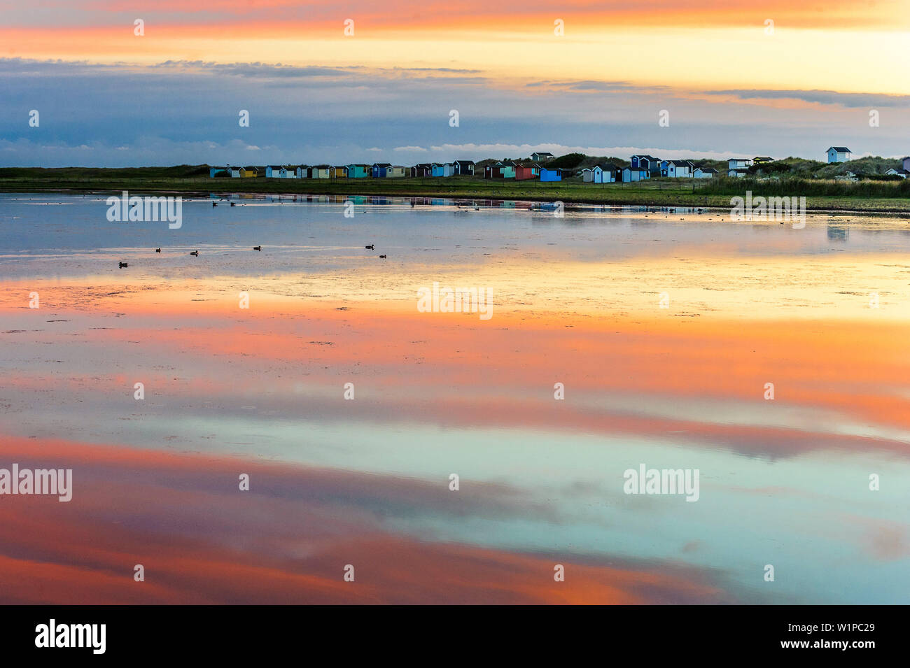 Colorful beach huts at Skanör med Falsterbo, Skane, Southern Sweden ...