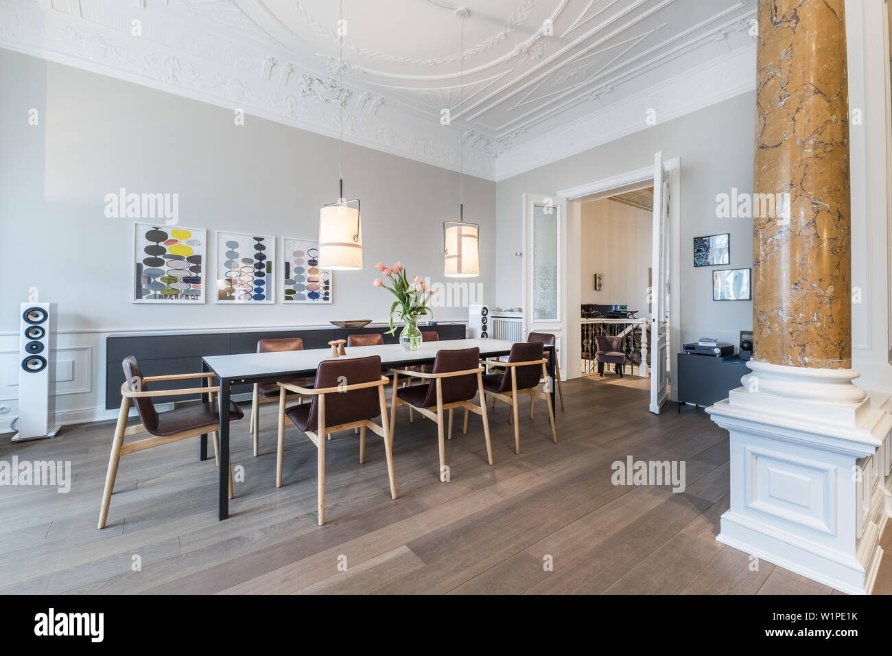 dining table in a modern furnished Art Nouveau apartment in Hamburg