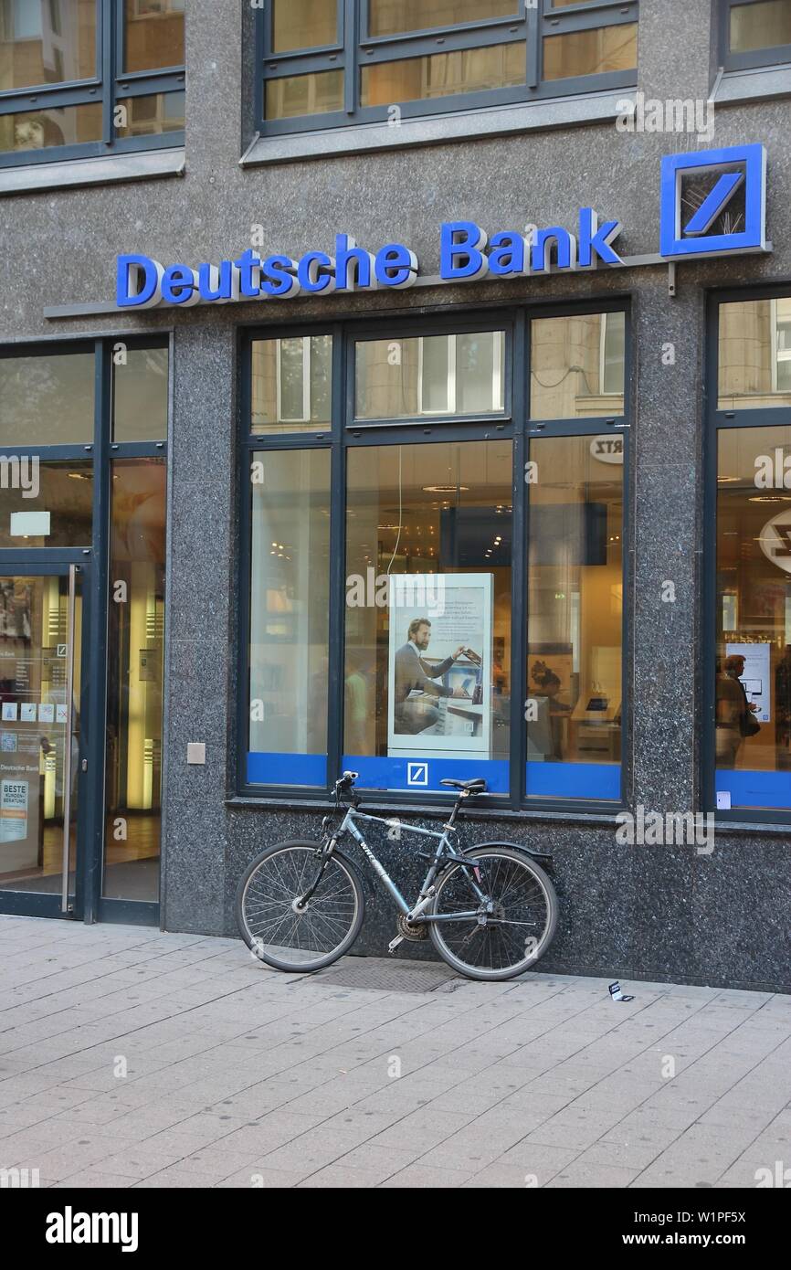 HAMBURG, GERMANY - AUGUST 28, 2014: Deutsche Bank branch in Hamburg. Deutsche Bank is one of largest banks in the world with 98,200 employees (2013). Stock Photo