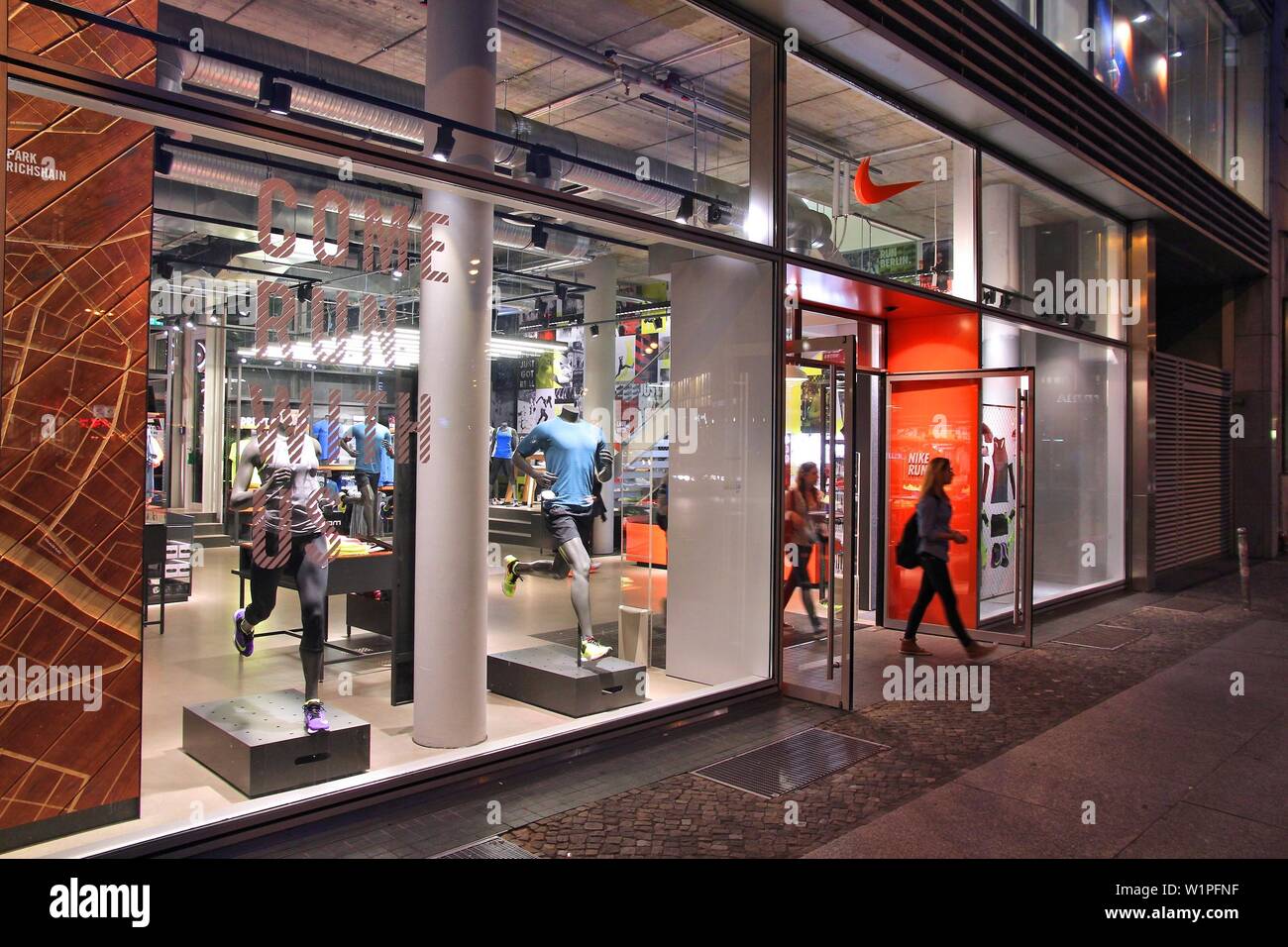 GERMANY AUGUST 25, People visit Nike store in Berlin. As of 2014 Nike Inc some 850 retail sports goods stores worldwide Stock Photo - Alamy