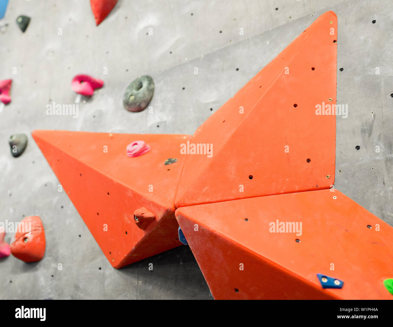 exercise wall at indoor climbing gym Stock Photo