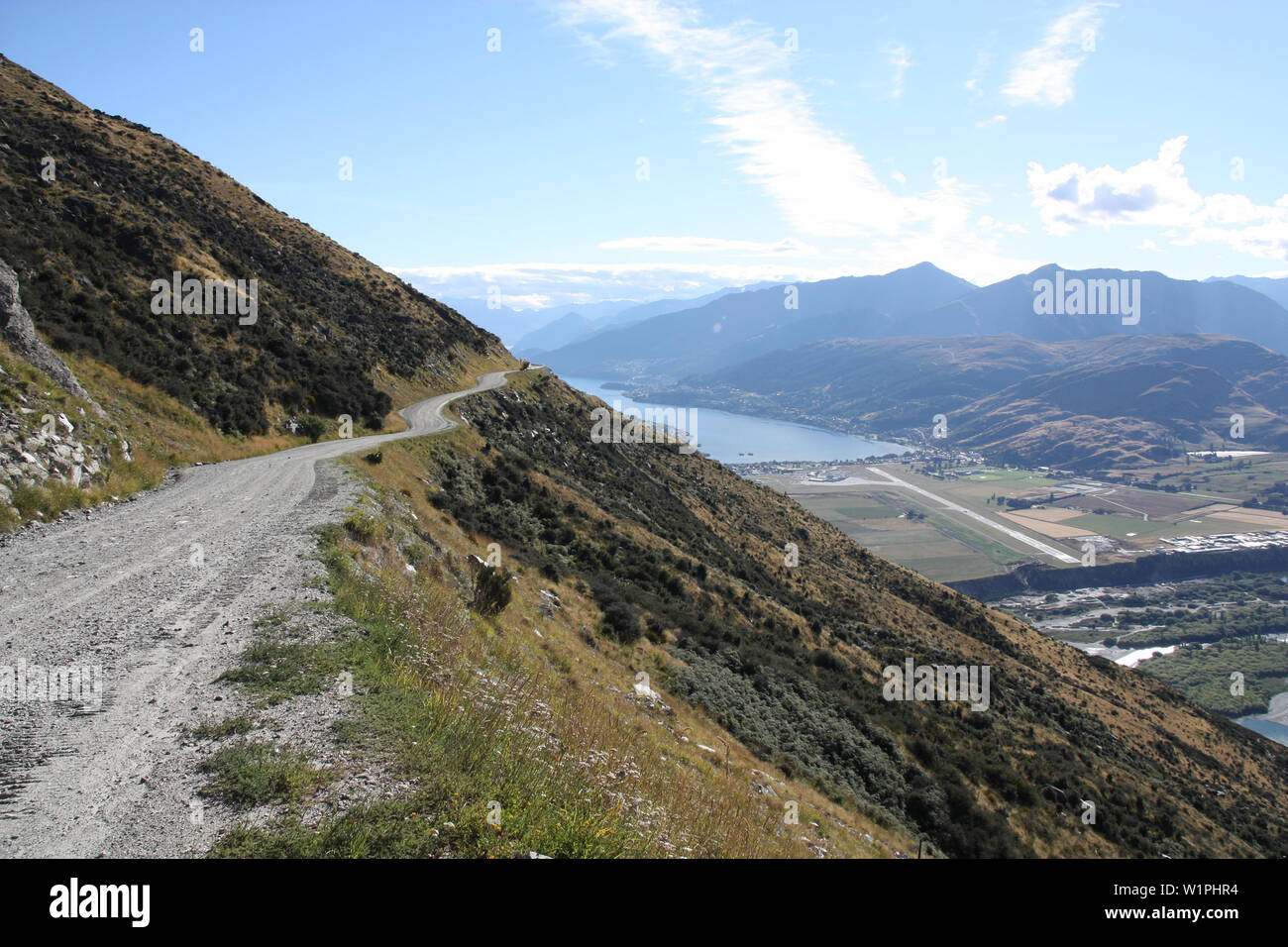 The Remarkables gravel road. Mountains in New Zealand's Otago region. South Island. Stock Photo