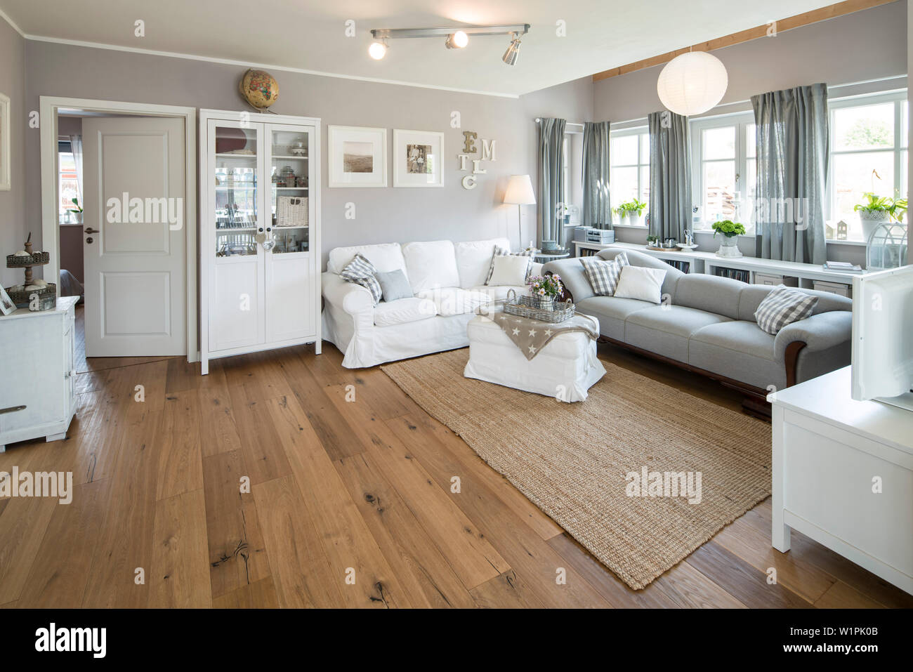 Modern Nordic Living Room In Family House With White And Gray Furniture And Wooden Floor Korbach Hesse Germany Europe Stock Photo Alamy