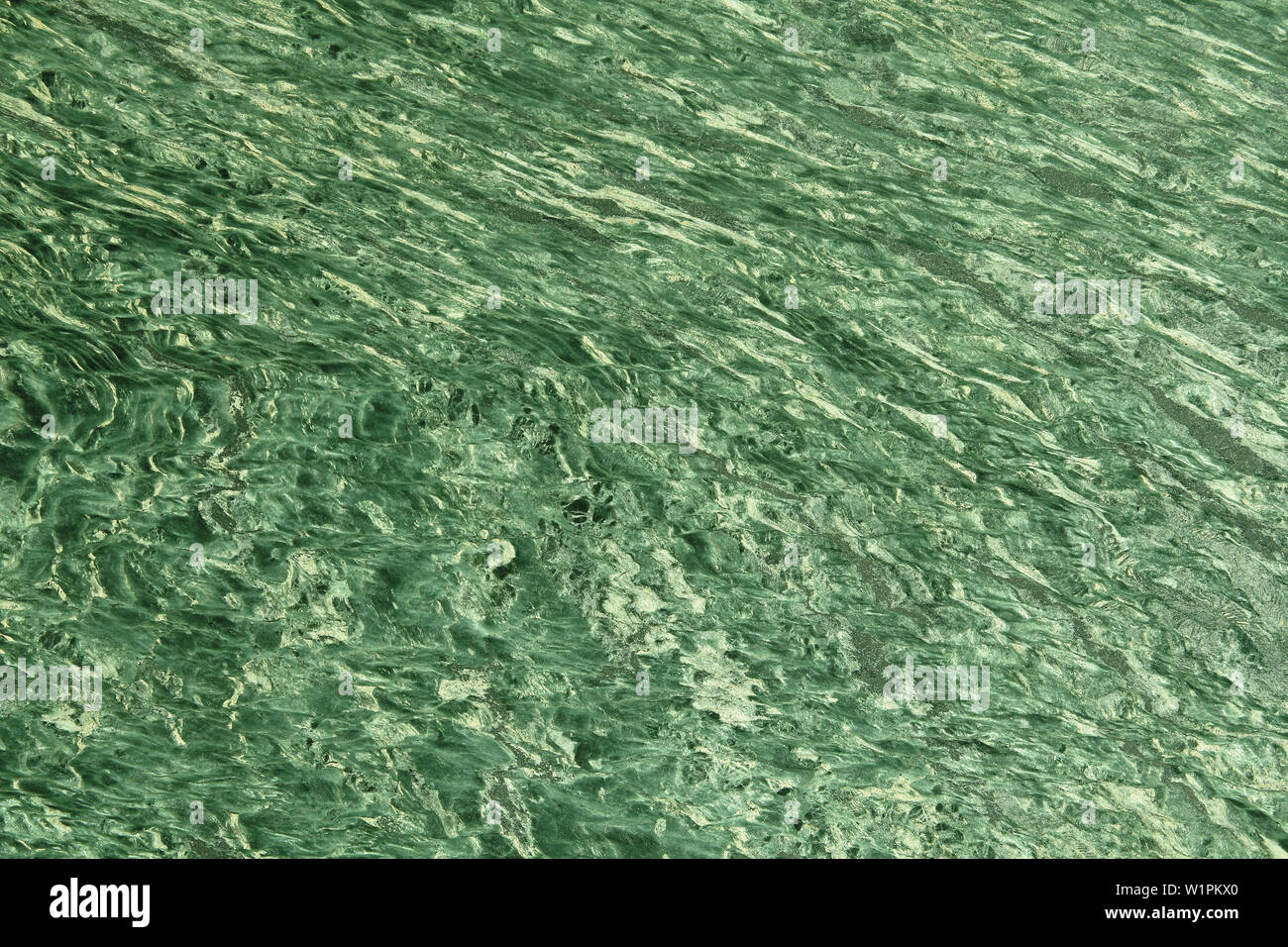 Green marble stone texture. Natural, solid patterned abstract Stock