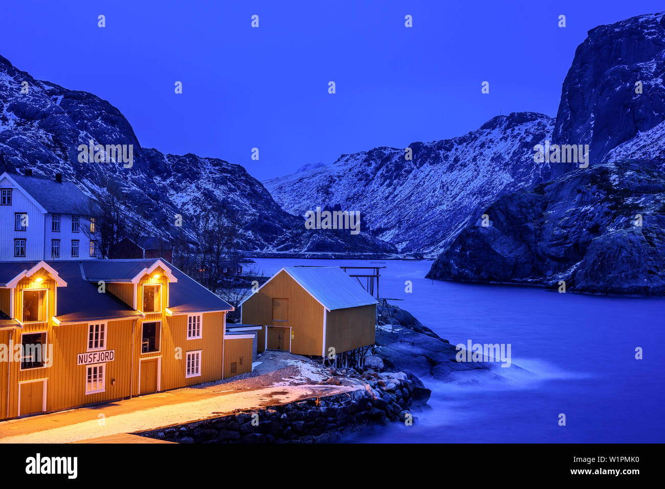 Fisherman´s cabins in Nusfjord at dusk, Nusfjord, Lofoten, Nordland, Norway Stock Photo