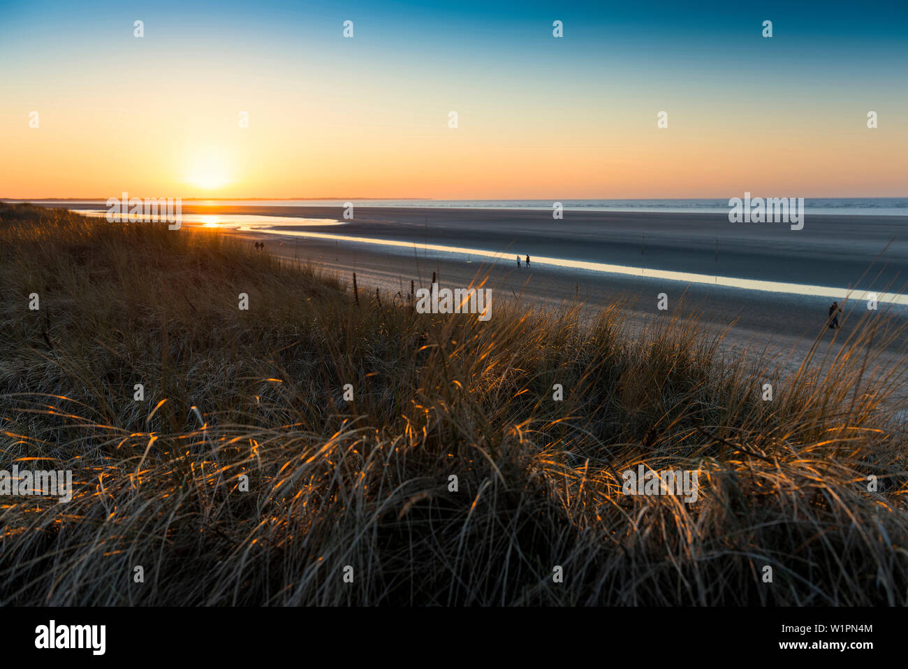 sunset the beach in winter, East Frisian Islands, Spiekeroog, Lower Saxony, North Sea, Germany Stock Photo