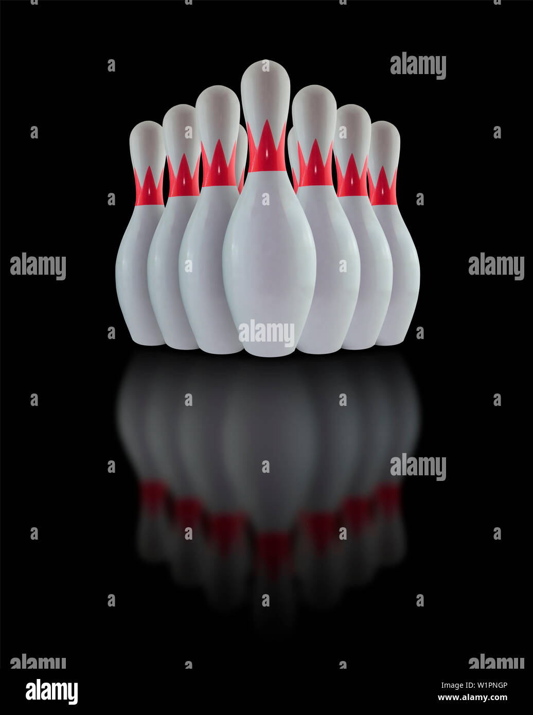 White Bowling pins isolated on black background Stock Photo