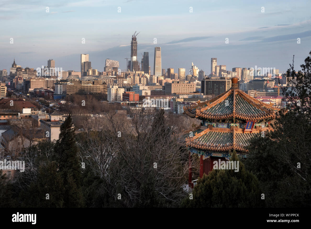 view from Jingshan Park at modern buildings of Beijing, traditional temple archiecture in front, China, Asia Stock Photo