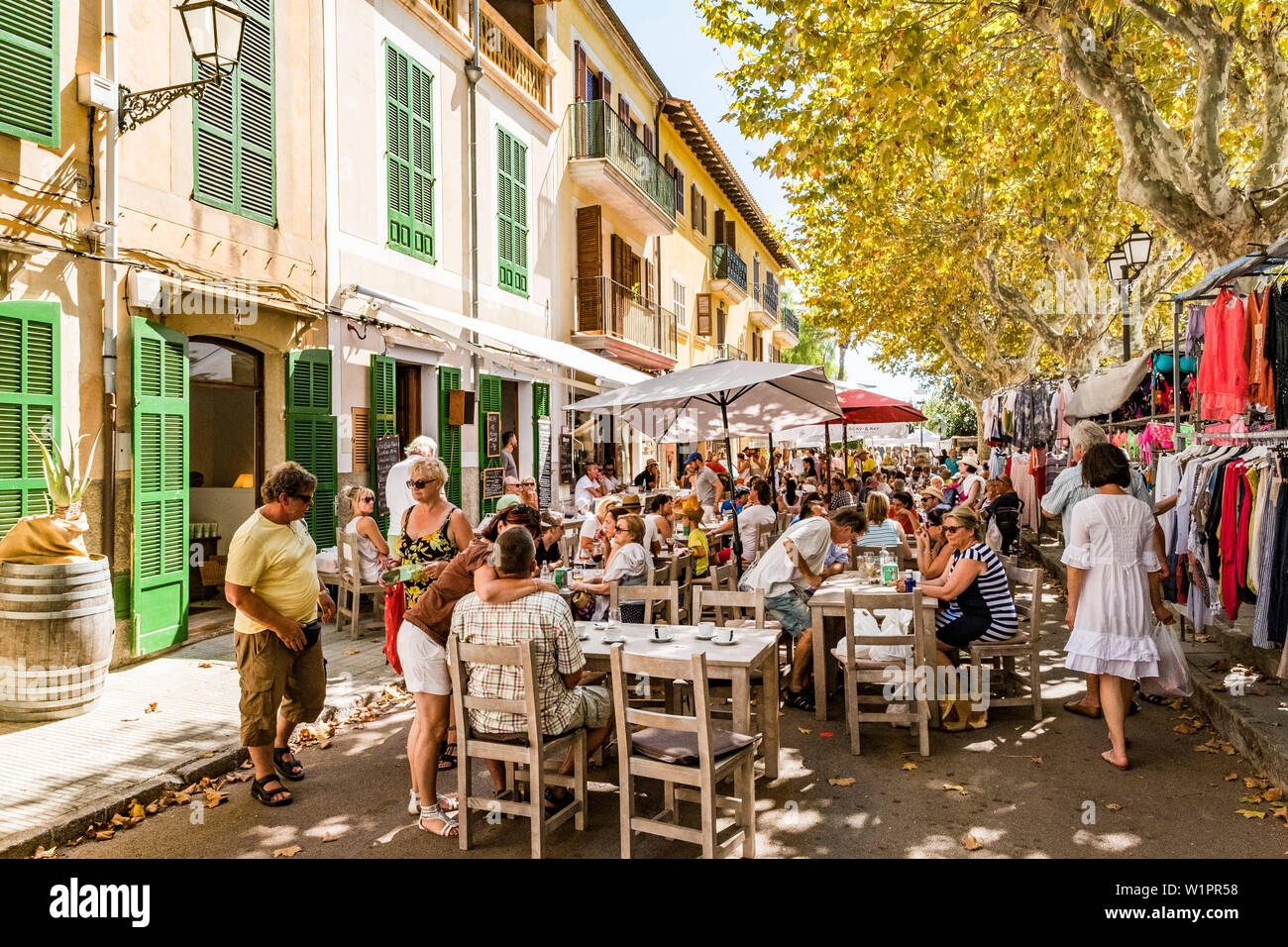 people in the sidewalk cafes of Arta, Mallorca, Balearic Islands, Spain Stock Photo