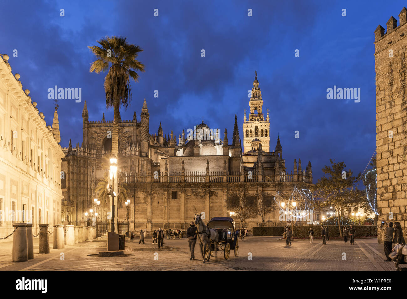 Cathedral of Seville, largest gothic cathedral in the world, Giralda, Clock tower, Carriage, Seville, Andalucia, Spain Stock Photo