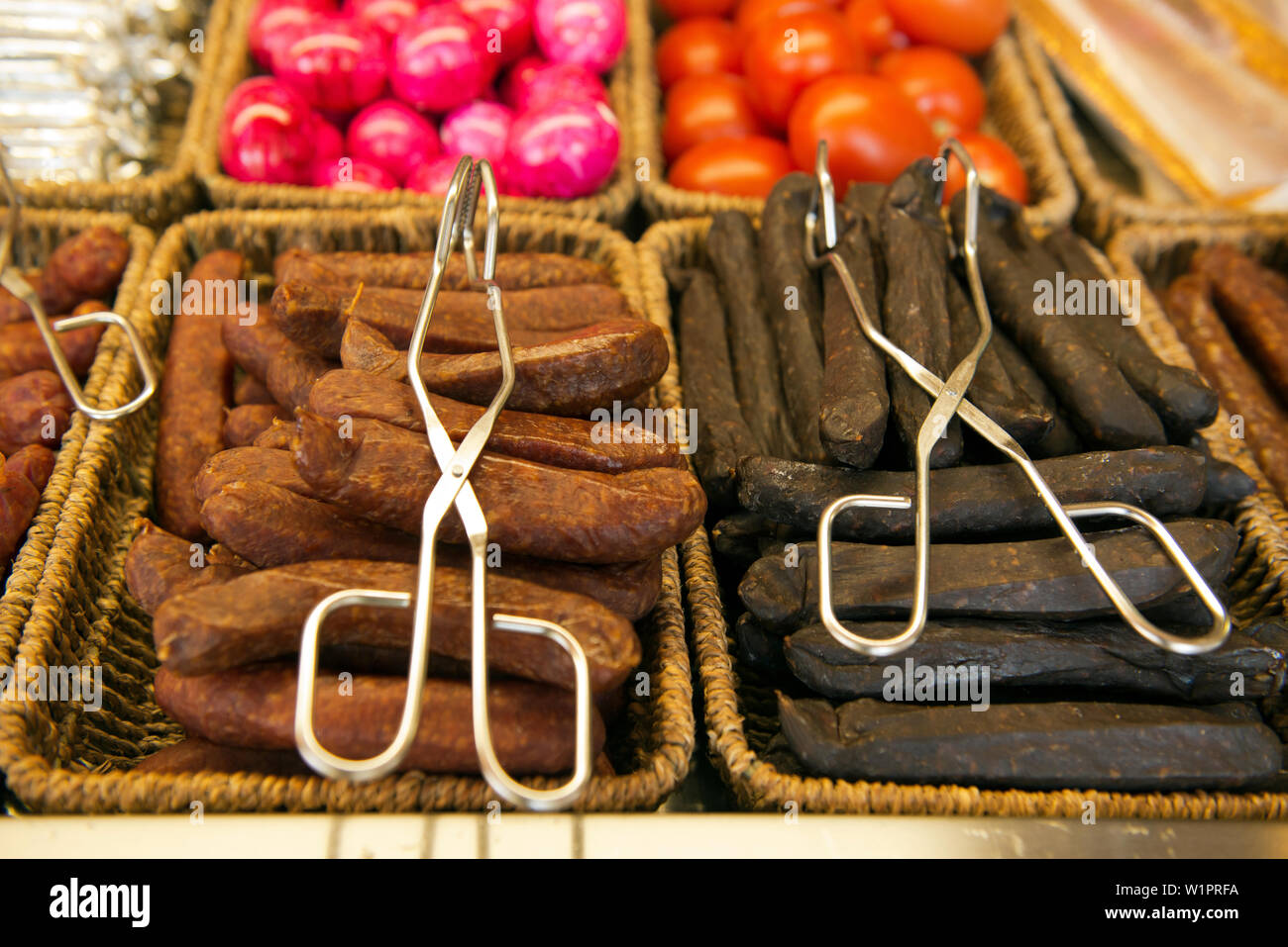 Landjäger, dried and smoked sausages are part of the food offerings at beer ardens, like at the beer garden at the Seehaus in the English Garden in Mu Stock Photo